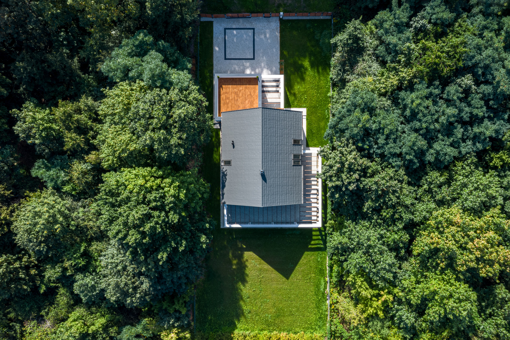 House in forest, drone view